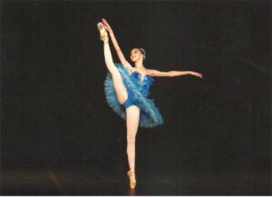 young dancer in tutu on stage